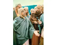 Srila Prabhupada Speaking on Morning Walk with Disciples Listening Intently