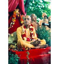 Prabhupada at New Vrindavan Sitting on Vyasasana Outside