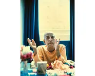 Prabhupada Sitting at His Desk Explaining the Krishna Philosophy