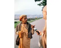 Srila Prabhupada Carrying a Cane on a Morning Walk