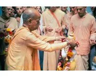 Srila Prabhupada offers a Flower Garland to Sri Sri Radha Paris-Isvara