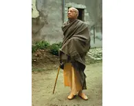 Srila Prabhupada in a very Stately Pose Outside Old Building Srila Prabhupada in a very Stately Pose Outside Old Building