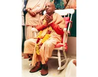 Srila Prabhupada in New York, Sitting in White Rocking Chair Srila Prabhupada in New York, Sitting in White Rocking Chair