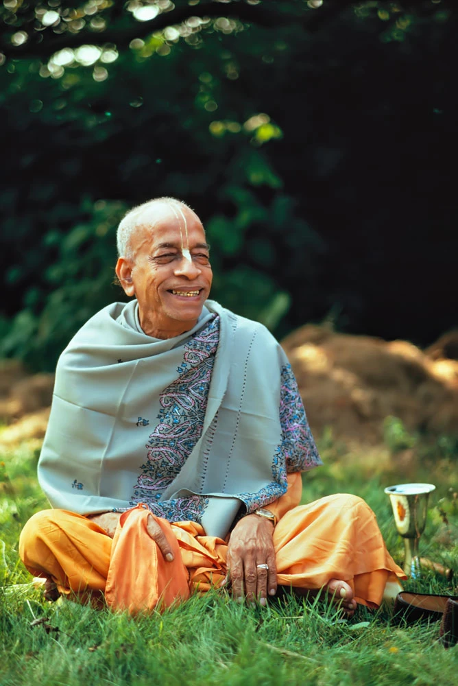 Srila Prabhupada at Bhaktivedanta Manor, London. Backyard, Smile